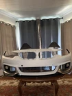 Bmw F32 Sport Front Bumper With Carbon Fiber Style Lip. Used. Price: $650.00.